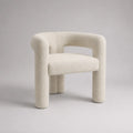 Poltrona imbottita in tessuto bouclé bianco crema con schienale curvo, 74 × 69 × 76 cm